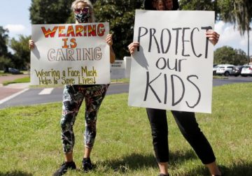 Biden says having children wear masks is not about politics – Reuters