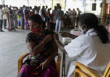 Half of India’s eligible population is now inoculated with first dose of Covid vaccine, says govt