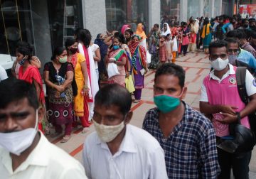 India COVID-19 vaccinations near record, new infections at five-month low – Reuters India