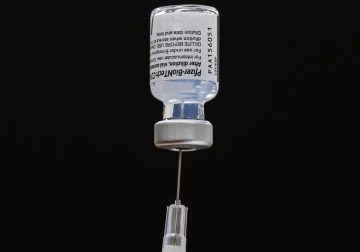 Biden Pushes Boosters, Schools Mandate Shots, and More News