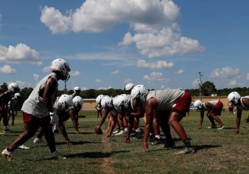 In a sports-crazed Arkansas town, football is a reason to get vaccinated – Reuters